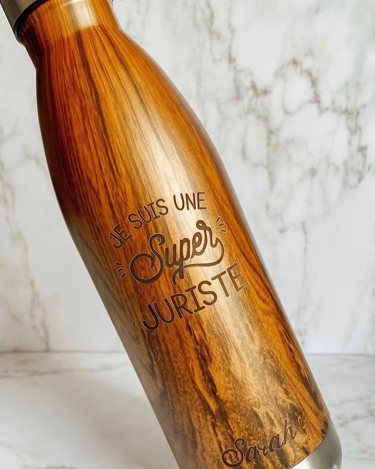 Gravure sur gourde en bois