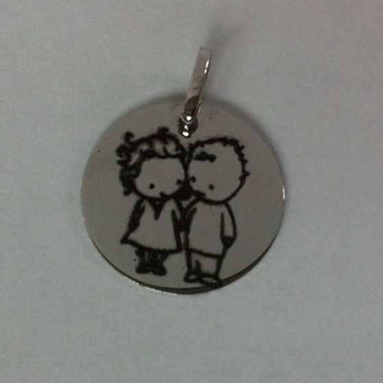 Gravure sur médaille ou pendentif