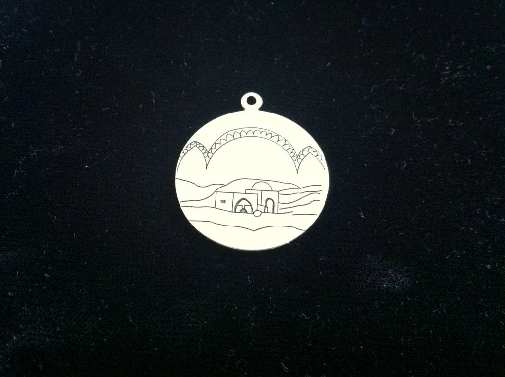 Gravure sur médaille ou pendentif